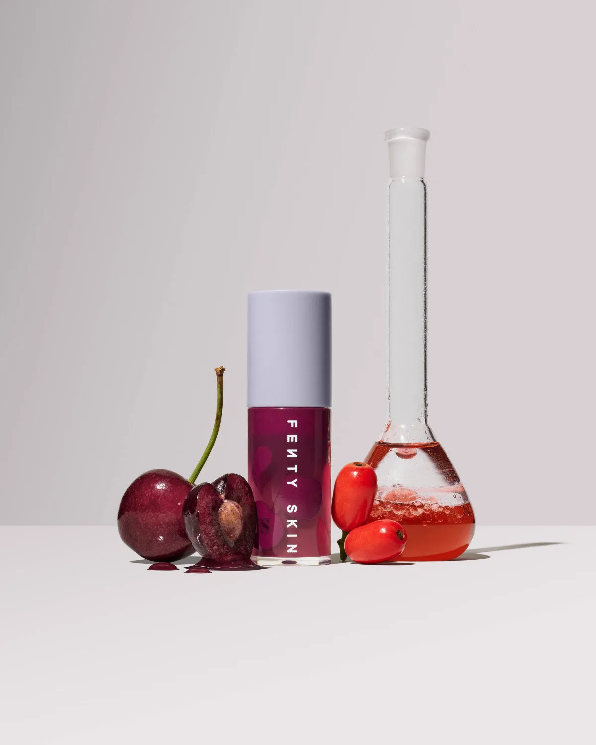 Fenty Treatz Hydrating   Strengthening Lip Oil — Black Cherry